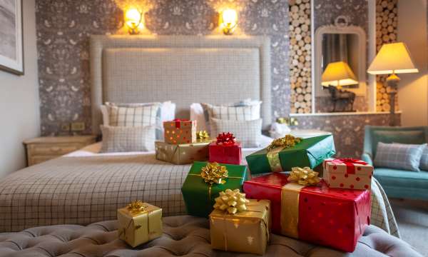 presents on bed at The Royal Hotel 